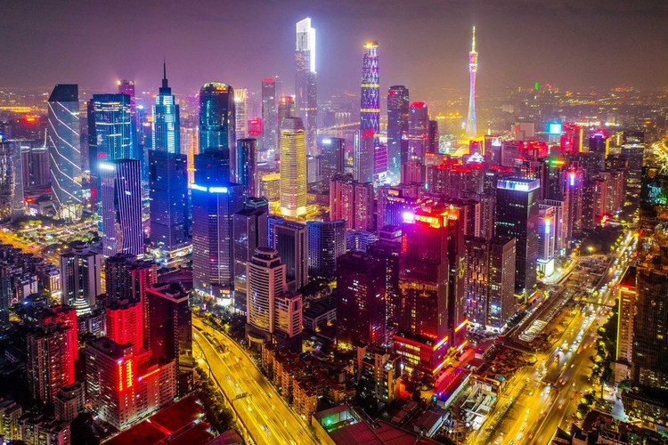 This aerial photo taken on Jan. 1, 2023 shows a night view of the commercial area around Tianhe Road in Guangzhou, south China's Guangdong Province. (Xinhua/Liu Dawei)