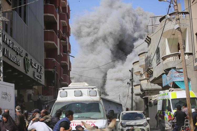 Smoke rises after Israeli attacks in the Nuseirat refugee camp in the central Gaza Strip on June 8, 2024. (Photo by Marwan Daoud /Xinhua)