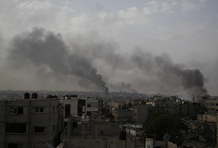 Smoke rises in Rafah city in the southern Gaza Strip, May 28, 2024. (Photo by Khaled Omar/Xinhua)