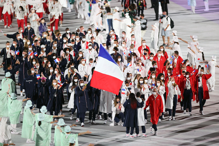 France's delegation parades into the Olympic Stadium during the opening ceremony of the 2020 Olympic Games in Tokyo, Japan, July 23, 2021. (Xinhua/Zheng Huansong)