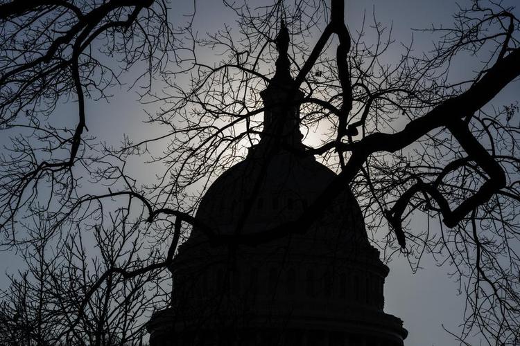 The silhouette of the U.S. Capitol building is seen in Washington, D.C., the United States, Feb. 6, 2024. (Photo by Aaron Schwartz/Xinhua)