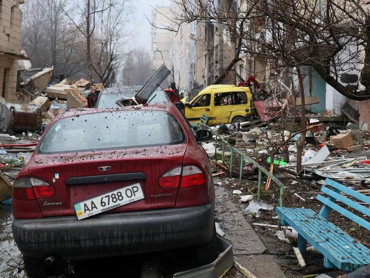 This photo taken on Jan. 2, 2024 shows buildings and cars damaged in a missile attack in Kiev, Ukraine. (Photo by Roman Petushkov/Xinhua)