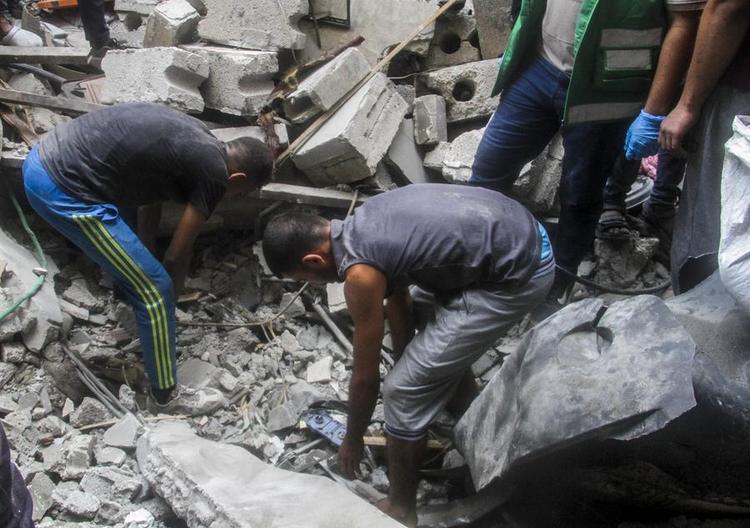 Rescue work is underway after a bombing on the Al-Hoja Street in the center of the Jabalia refugee camp in northern Gaza Strip on June 29, 2024. (Photo by Mahmoud Zaki/Xinhua)