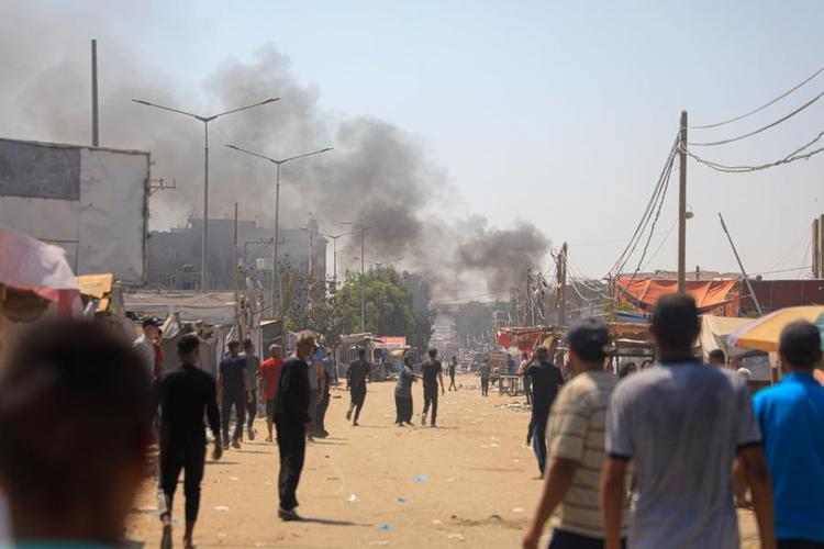 This photo taken on July 13, 2024 shows smoke rising following an Israeli airstrike in the Mawasi area of the southern Gaza Strip city of Khan Younis. (Photo by Rizek Abdeljawad/Xinhua)