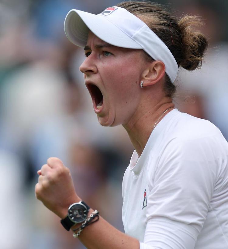 Barbora Krejcikova celebrates a point during her Wimbledon women's singles final win against Jasmine Paolini in London, Britain, July 13, 2024. (Xinhua/Li Ying)