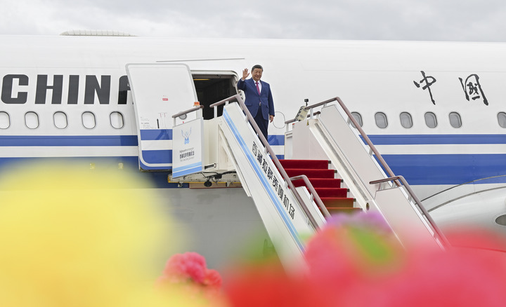 Chinese President Xi Jinping, also general secretary of the Communist Party of China Central Committee and chairman of the Central Military Commission, steps out of the cabin and waves to people upon his arrival in Lhasa, southwest China's Xizang Autonomous Region, Aug. 20, 2025. Xi, who leads a central delegation, arrived in Lhasa, capital of Xizang, on Wednesday to attend activities in celebration of the region's 60th founding anniversary. (Xinhua/Yin Bogu)