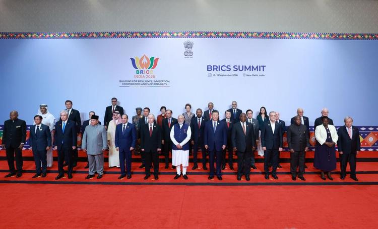 Chinese President Xi Jinping poses for a group photo with other leaders attending the 18th BRICS Summit before the second day of the summit in New Delhi, India, Sept. 13, 2026. Xi attended the second day of the 18th BRICS Summit here on Sunday. (Xinhua/Wang Ye)