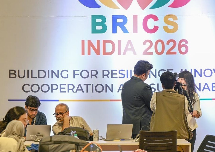 Media staff work at the media center at Bharat Mandapam, the main venue of the 18th BRICS Summit in New Delhi, India, Sept. 12, 2026. (Xinhua/Javed Dar)