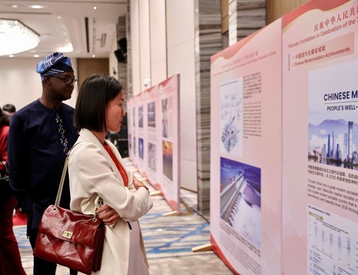 Guests visit a photo exhibition featuring China-Africa cooperation in Addis Ababa, Ethiopia, on Sept. 24, 2026. (Xinhua/Geng Xinning)
