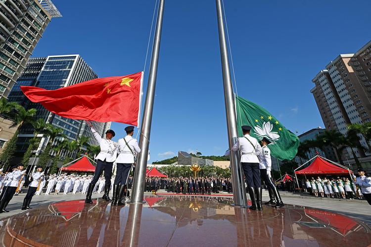 A flag-raising ceremony marking the 77th anniversary of the founding of the People's Republic of China is held at the Golden Lotus Square in Macao, south China, Oct. 1, 2026. (Xinhua)