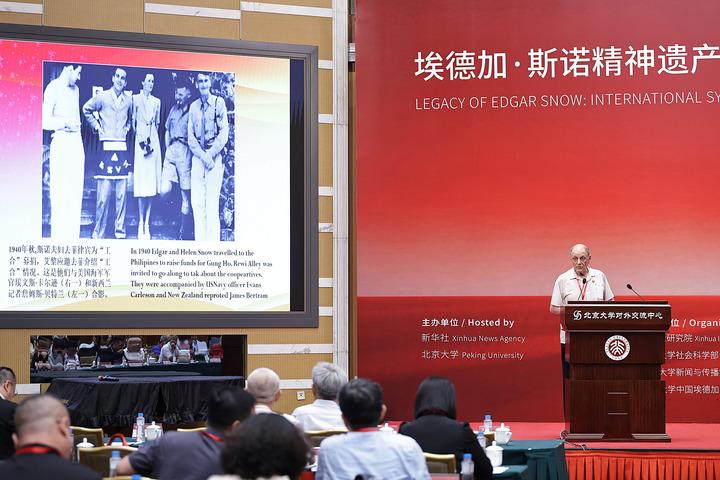 Michael Crook, chairman of the International Committee for the Promotion of Chinese Industrial Cooperatives, speaks at an international symposium at Peking University (PKU) in Beijing, capital of China, July 8, 2026. An international symposium themed on "Legacy of Edgar Snow: International Symposium on Contemporary Value and Inspiration to the World" kicked off here on Tuesday. (Xinhua/Zhang Yuwei)