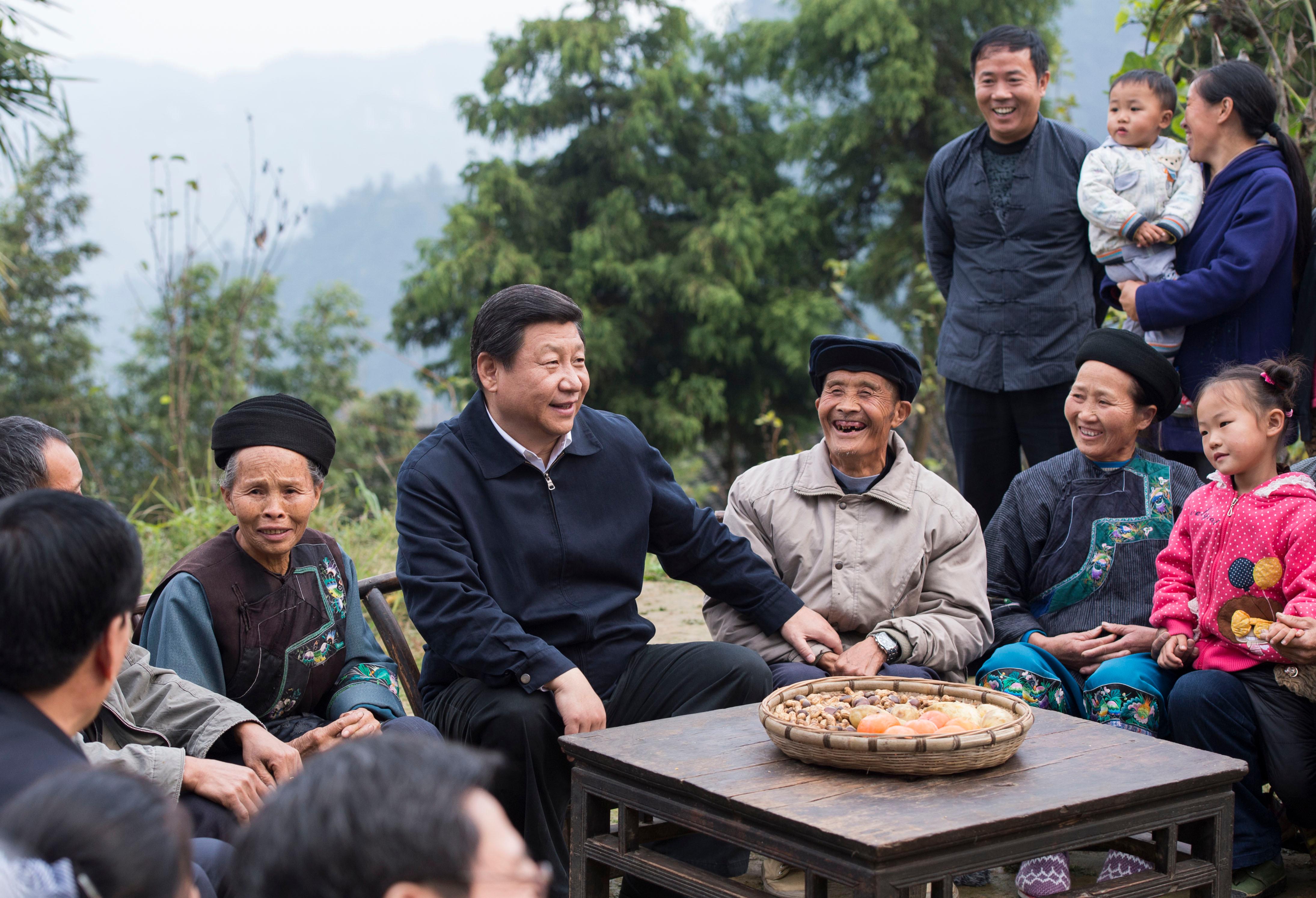 Xi Jinping talks with local villagers and cadres at Shibadong Village in Paibi Township of Huayuan County in the Tujia-Miao Autonomous Prefecture of Xiangxi, central China's Hunan Province, Nov. 3, 2013. (Xinhua/Wang Ye) Xi Jinping talks with local villagers and cadres at Shibadong Village in Paibi Township of Huayuan County in the Tujia-Miao Autonomous Prefecture of Xiangxi, central China's Hunan Province, Nov. 3, 2013. (Xinhua/Wang Ye)
