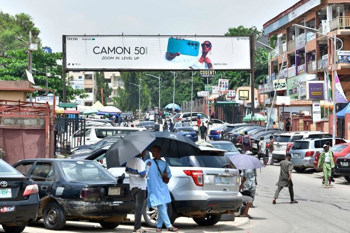 This photo taken on Oct. 9, 2026 shows an advertisement for Chinese mobile phone brand Tecno on a street in Abuja, Nigeria. (Xinhua/Hong Zehua)